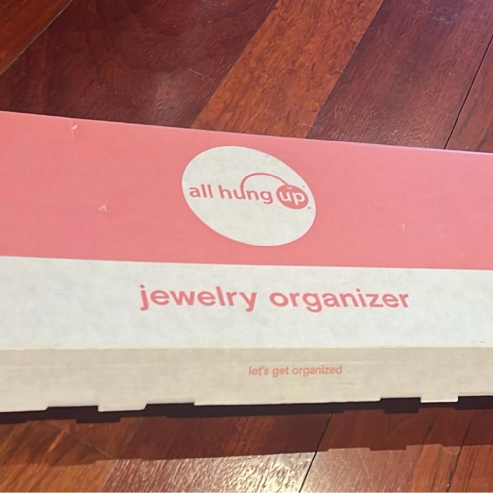 Elegant Pink and White Jewelry Organizer for Stylish Storage